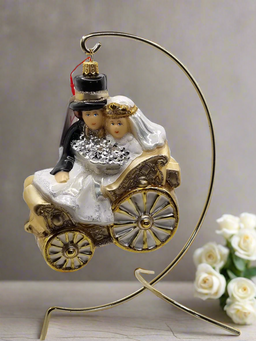 European Glass Christmas ornament of a Bridal Couple In Wedding Carriage (Y)