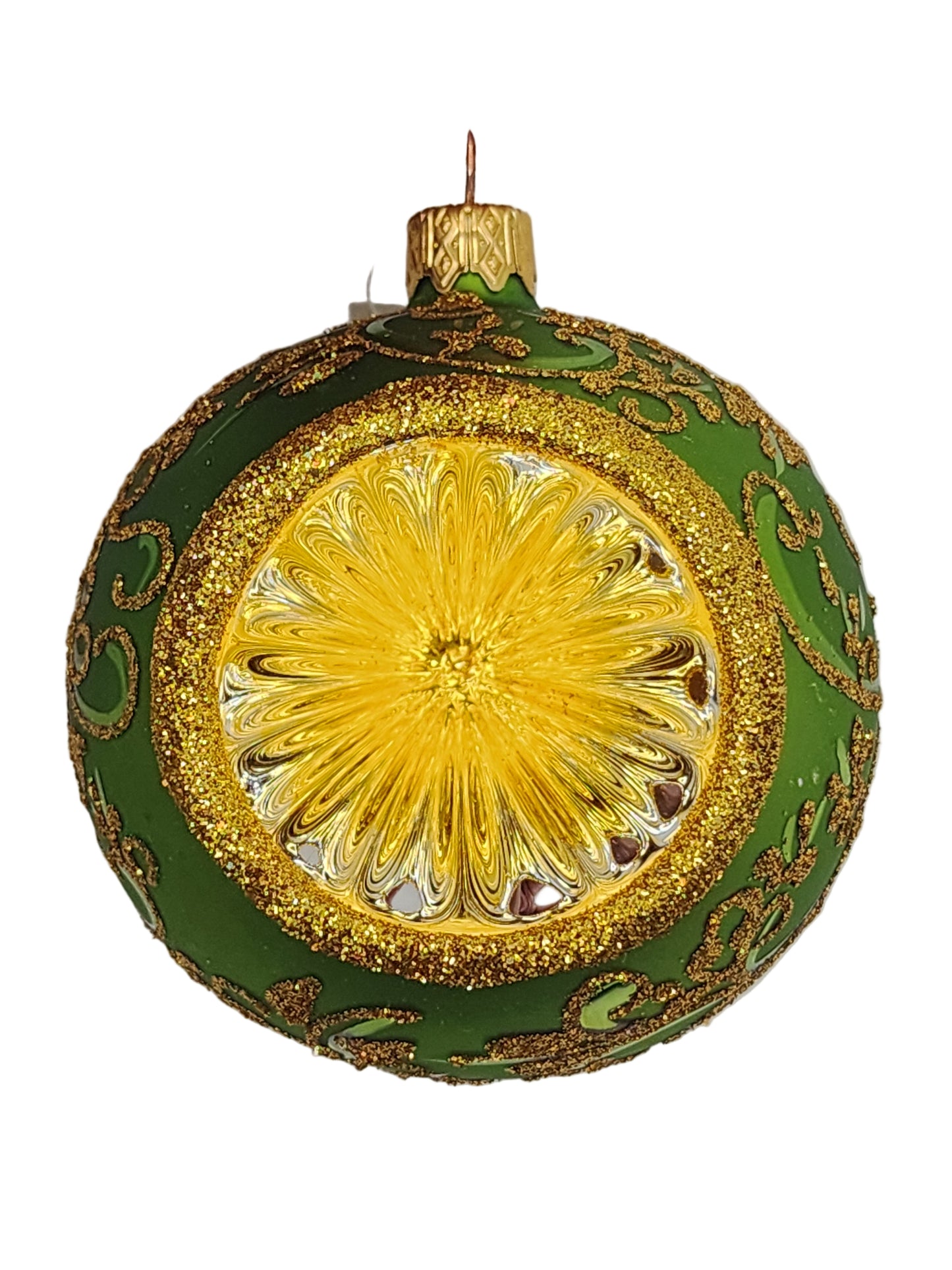 Decorative green and gold ornament against a white background