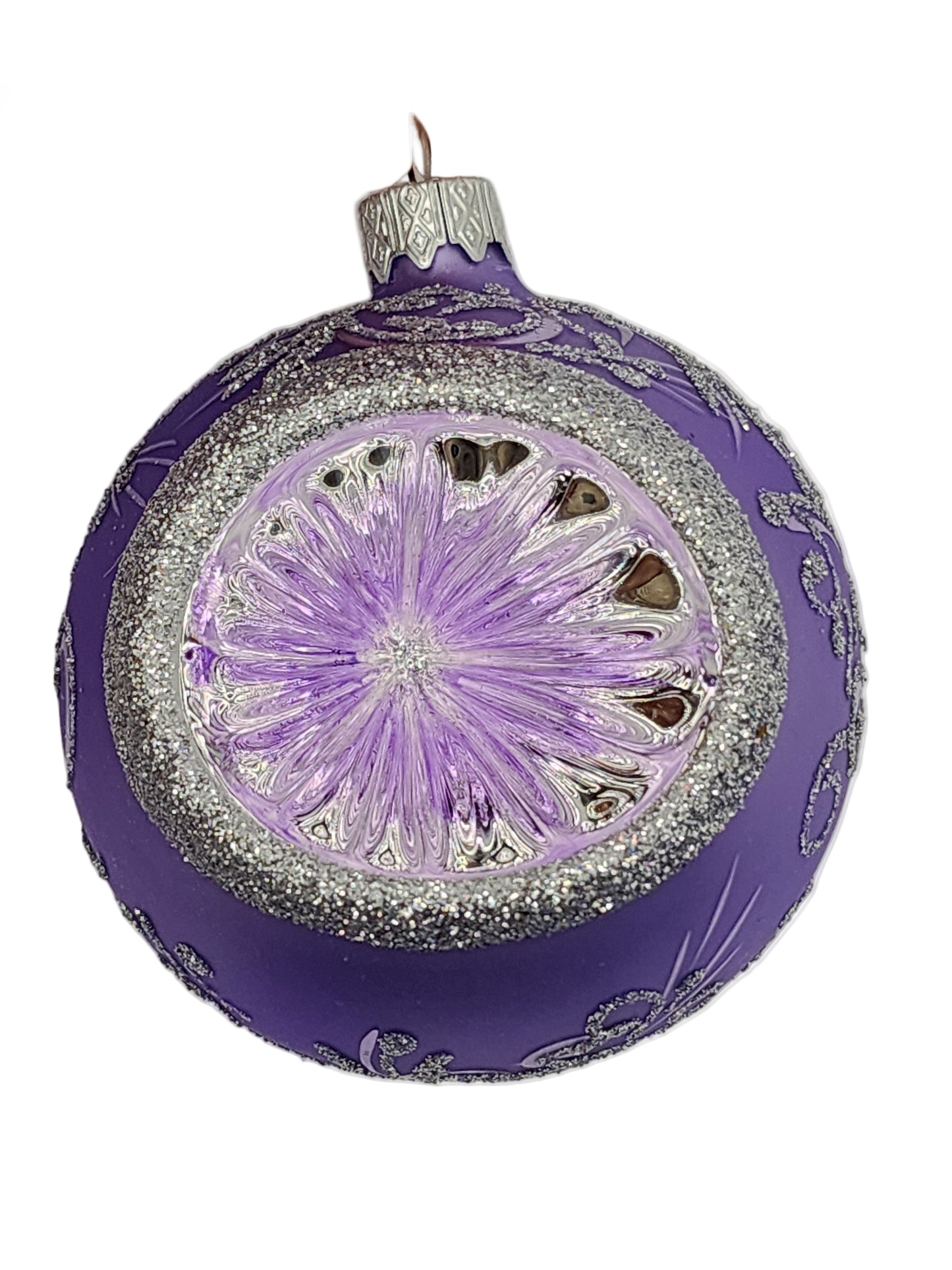 Decorative purple and silver ornament on a white background