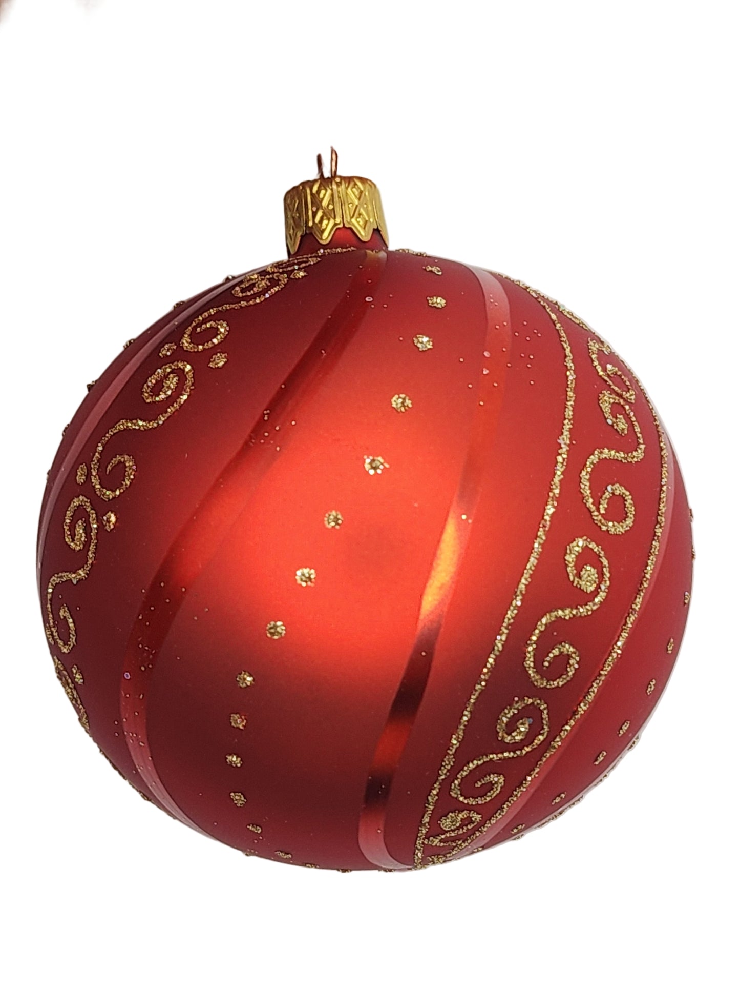 Red Christmas ornament with gold decorations against a white background