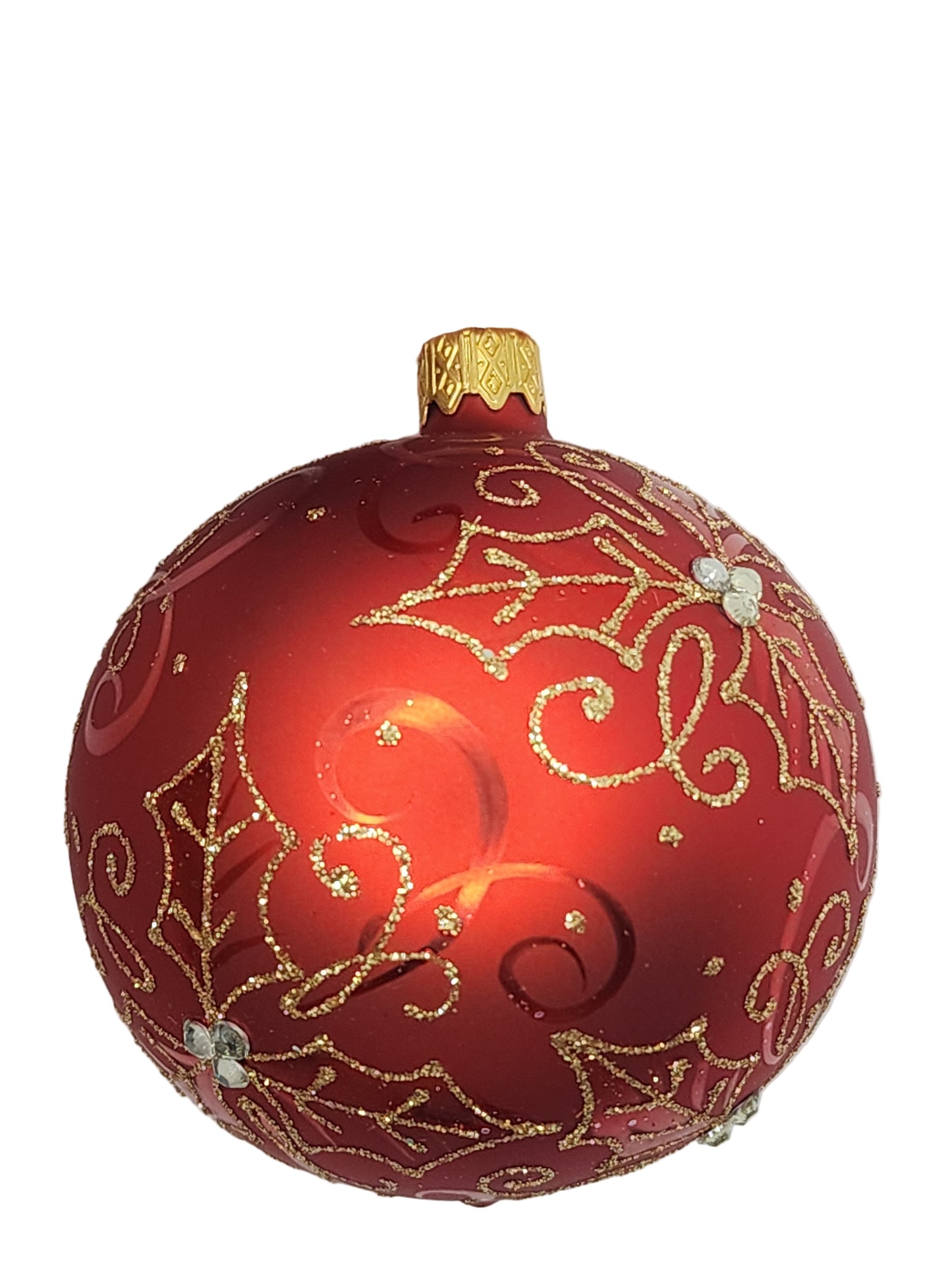 Red Christmas ornament with gold decorations against a white background
