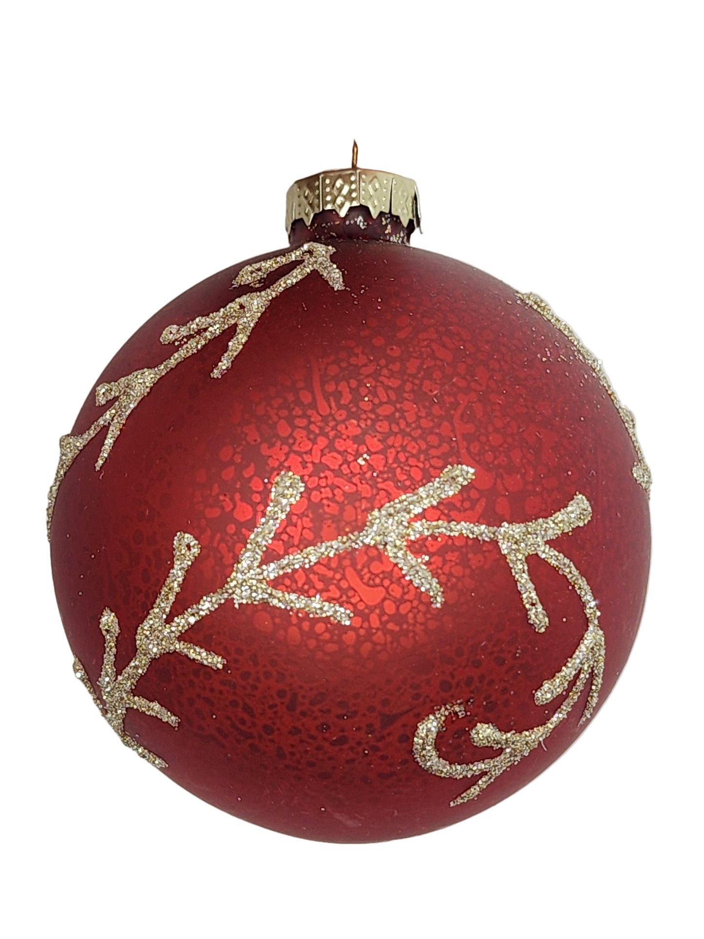 Red Christmas ornament with gold decorative patterns against a white background