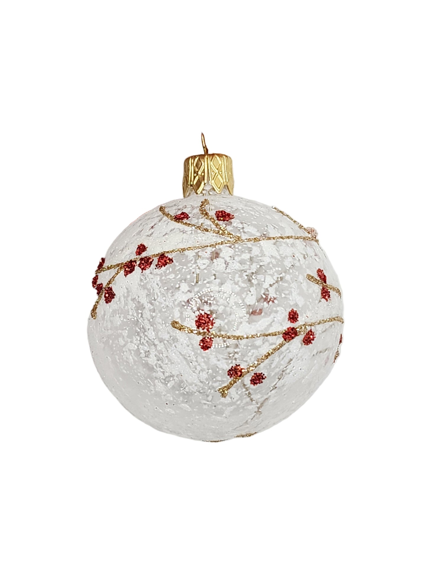 Decorative ornament with red berries and gold accents on a white background