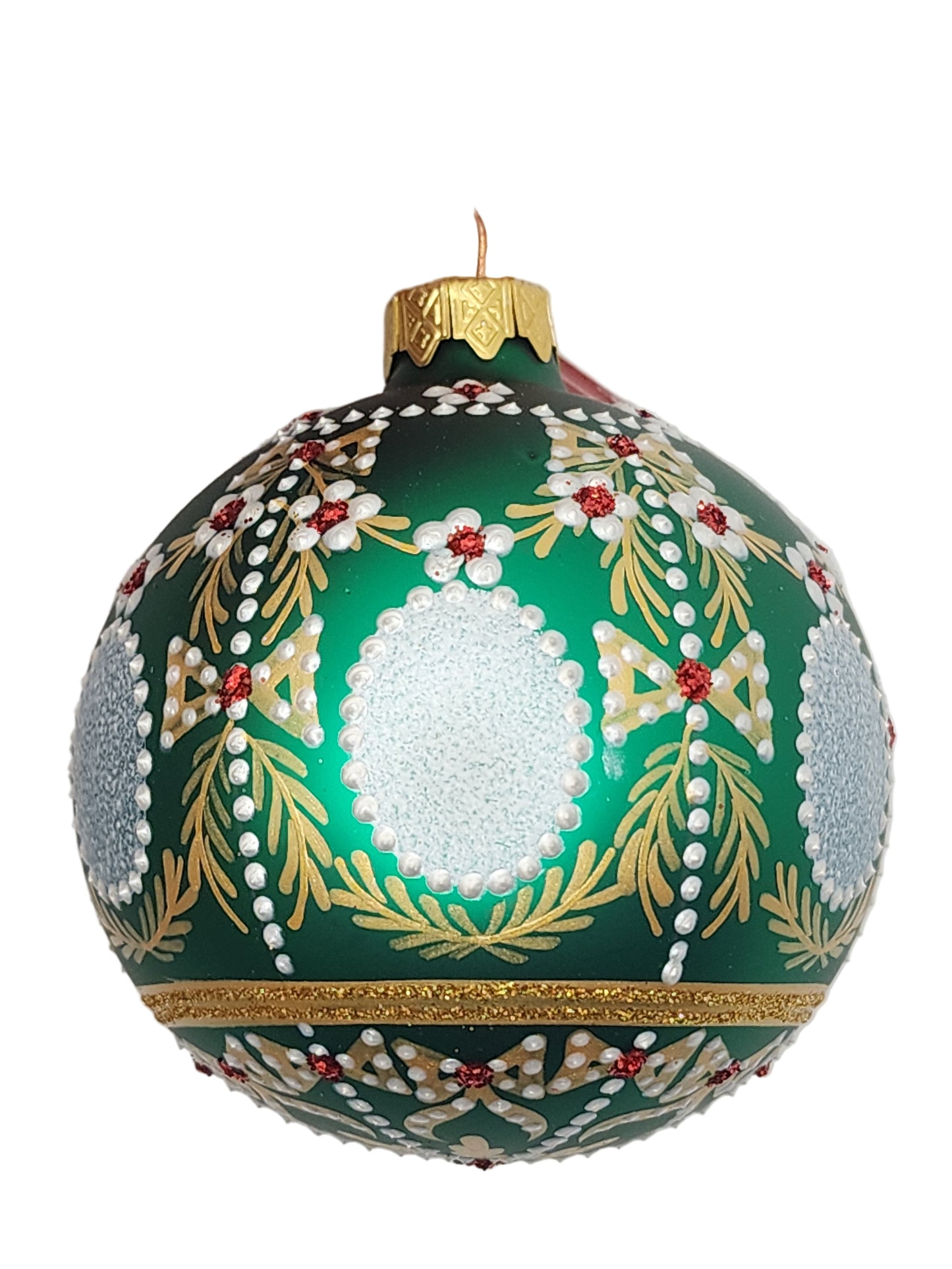 Decorative green Christmas ornament with gold and red details on a white background