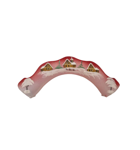 Decorative arch four candle holder with a winter scene design on a red background