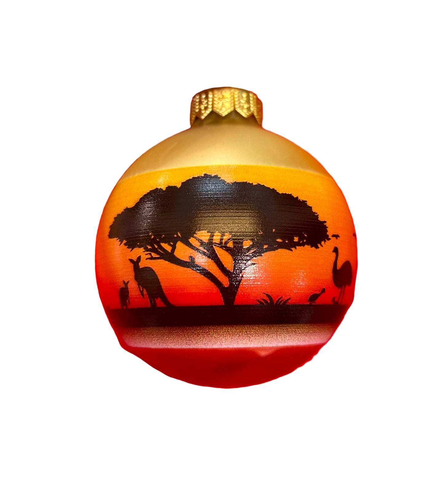 Decorative ornament with sunset design and tree and Australian animal silhouette on a white background