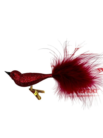Red glittery bird-shaped christmas ornament with feathers 