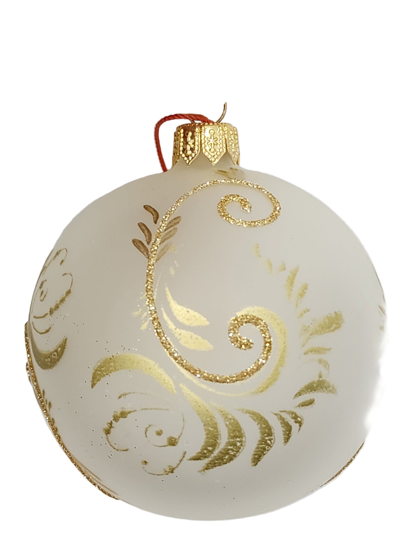 White Christmas ornament with gold decorations against a white background
