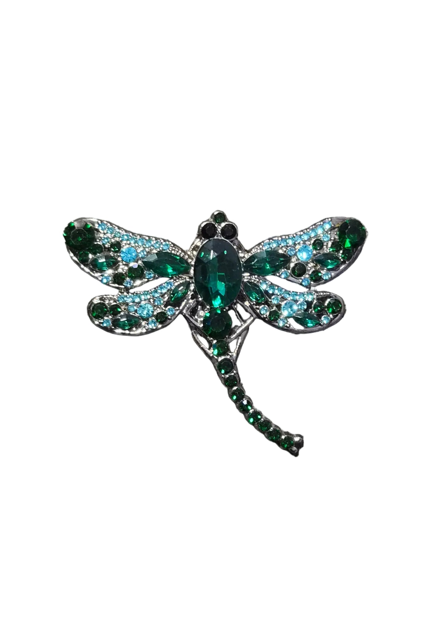 A dragonfly-shaped brooch with green and blue rhinestones
