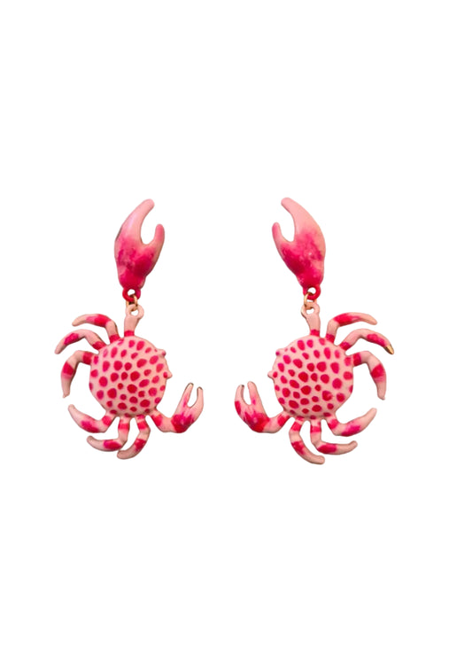A pair of dangling earrings shaped like crabs, featuring a textured pink and red pattern with rose gold-toned claws.