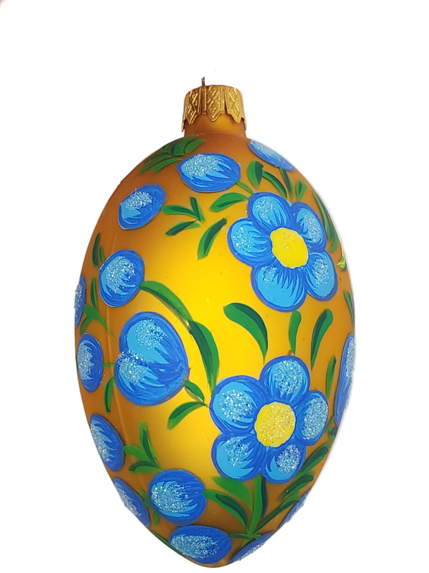 Decorative egg with blue floral patterns on a white background