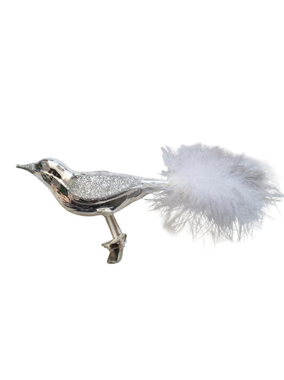 Colorful bird-shaped glass Christmas ornament on a clip