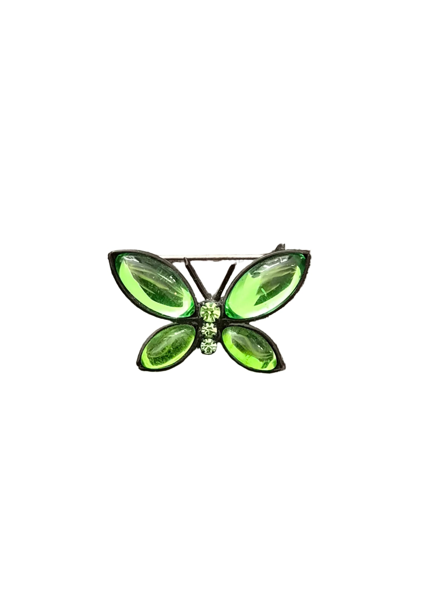 A green butterfly-shaped brooch with four marquise-cut green rhinestones and a small central cluster of clear stones.
