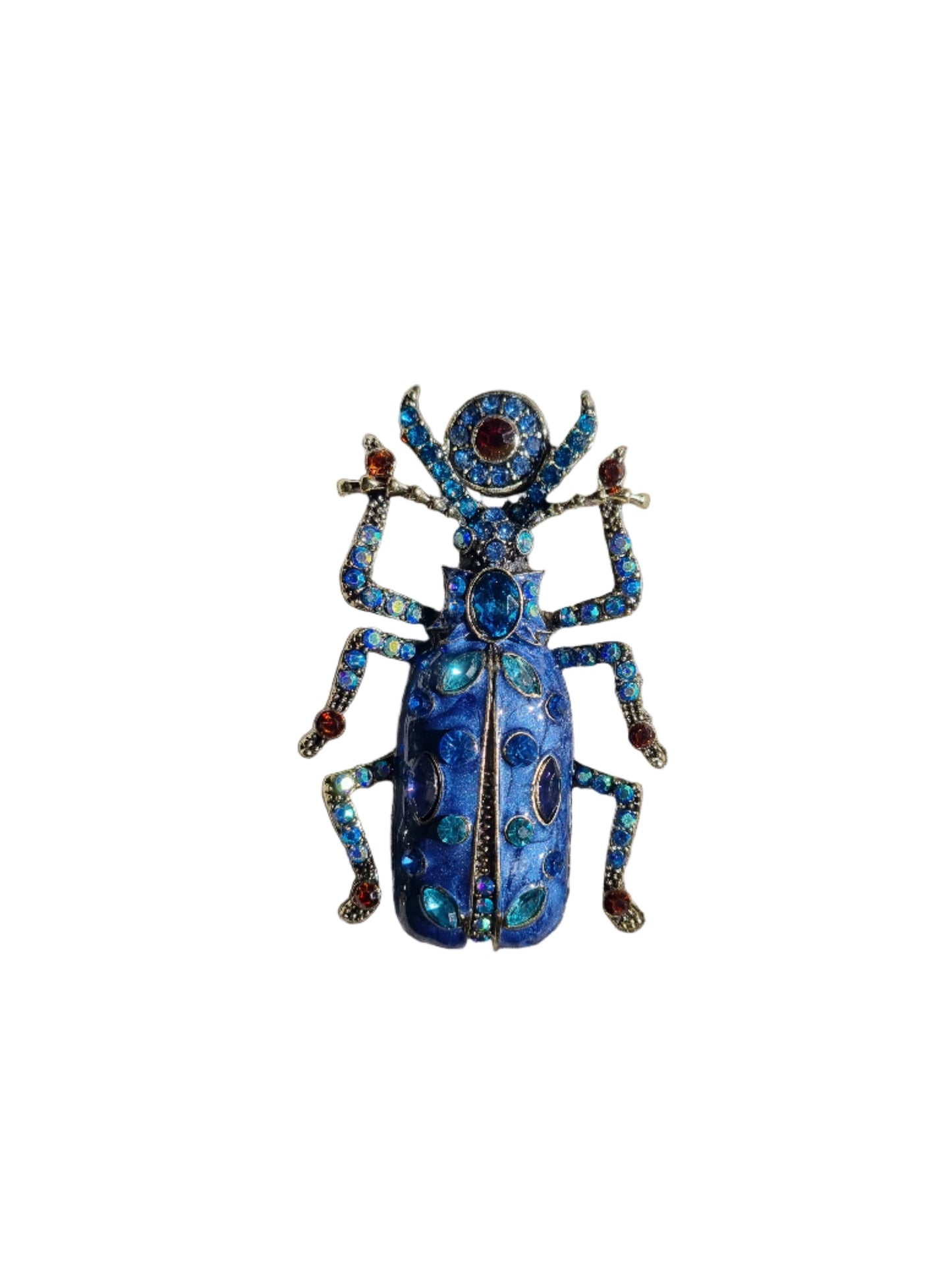Decorative beetle-shaped brooch with blue and multicolored gemstones