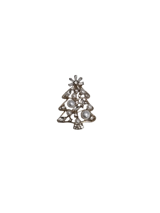 Decorative brooch with pearls and crystals on a gray background