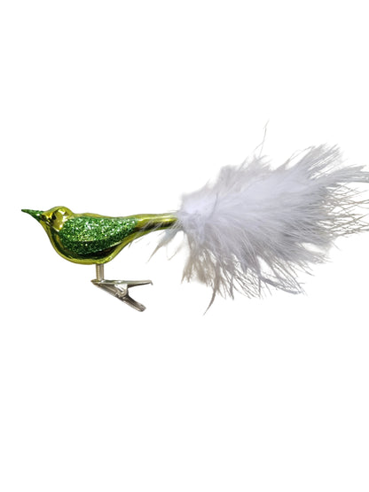 Green glittery bird ornament with a feather 