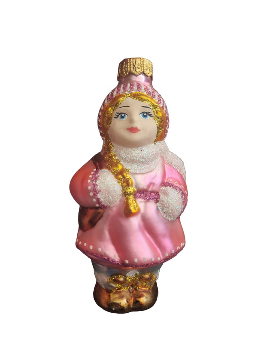 Decorative glass figurine of a girl in a pink dress 